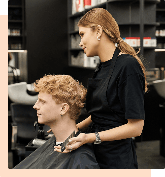 Stylist cutting a man's hair