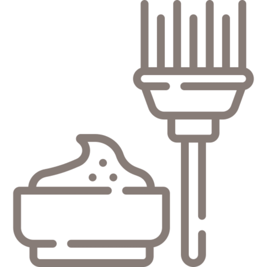 Icon of a brush and bowl with cream.
