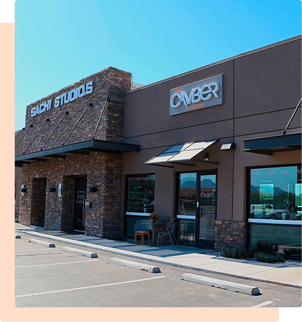 Stone-faced storefronts and empty parking lot