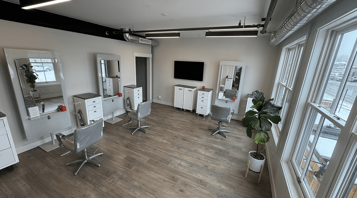 Bright modern hair salon with large windows